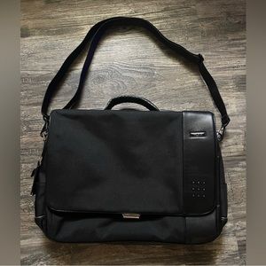 TUMI BRIEFCASE LAPTOP BAG  (zippers in back to attach  suitcase handles)